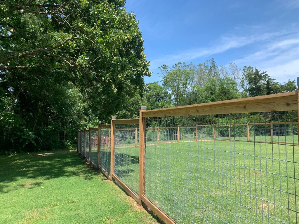 Coker Contracting's wood fence with rabbit wire